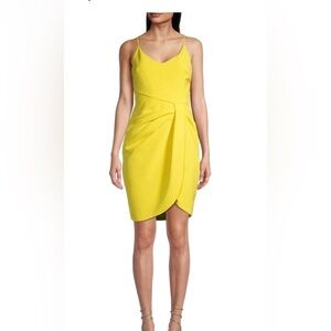 Black Halo yellow mini cocktail dress
Size S(4-6)
Worn once